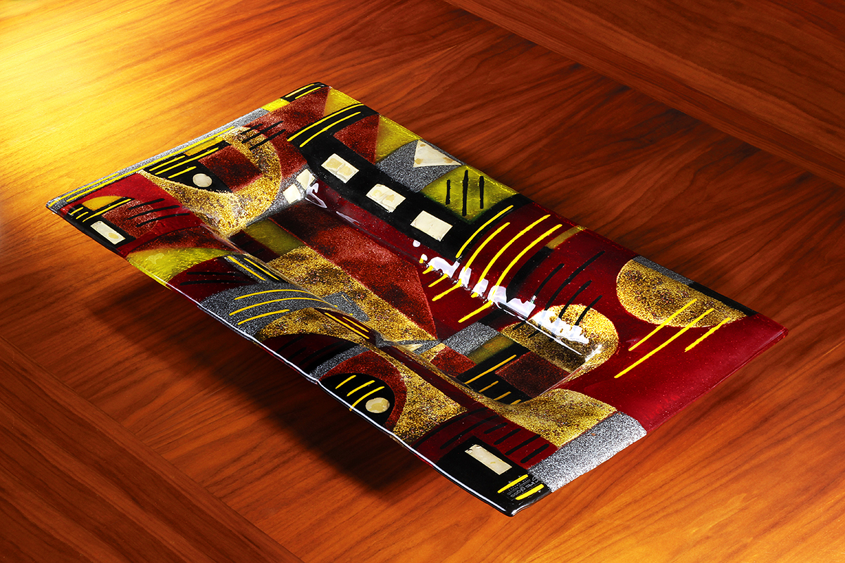 Red black and gold geometric fused glass rectangular platter from Harmony of the Spheres collection by Iris Glass