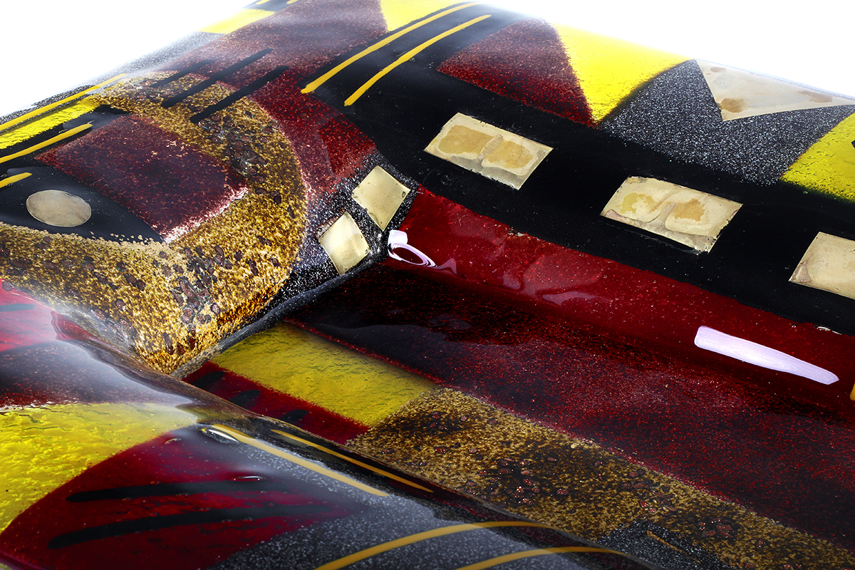 Red black and gold geometric fused glass rectangular platter from Harmony of the Spheres collection by Iris Glass