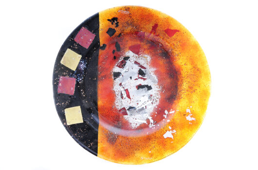 Amber and black contemporary fused glass round plate from Troy: Dawn of War collection by Iris Glass