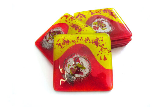 Red and yellow handmade fused glass coasters from Tutti Frutti collection by Iris Glass