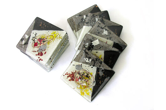 Handmade black and white glass coasters from Zeus collection by Iris Glass